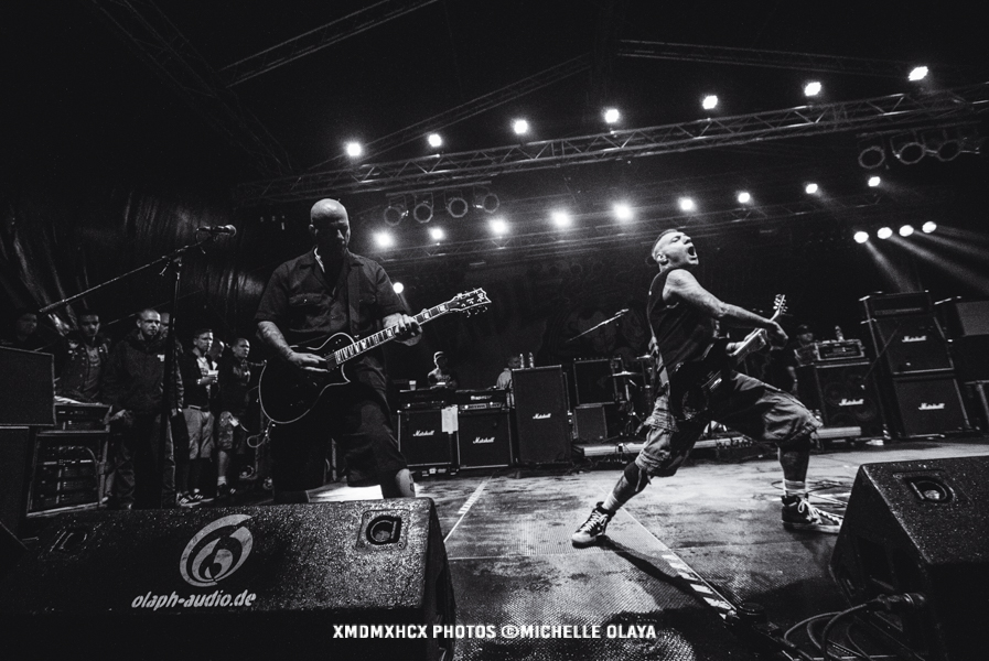 Craig Silverman together with Vinnie Stigma on stage for Agnostic Front